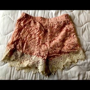 Short pink lace shorts from Italy
